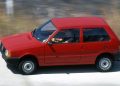 Eu ao volante do Fiat Uno Mille em 1990 (Foto: Cláudio Larangeira/Quatro Rodas)
